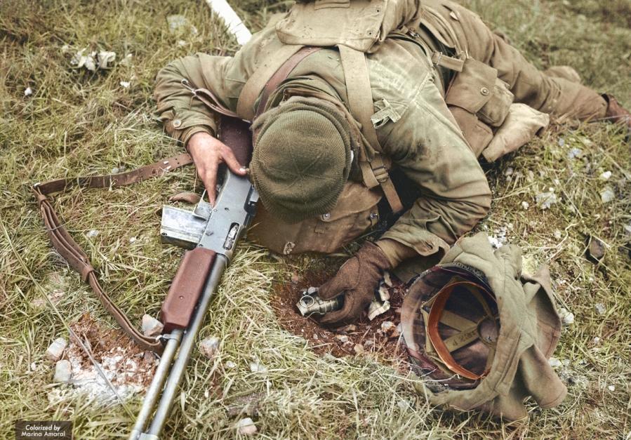 An unidentified American soldier, shot dead by a German sniper
