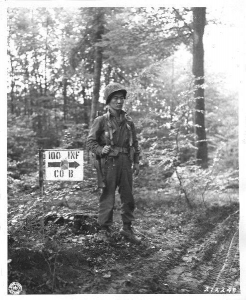 Japanese-American soldier of the 100 Infantry Battalion hanging his laundry